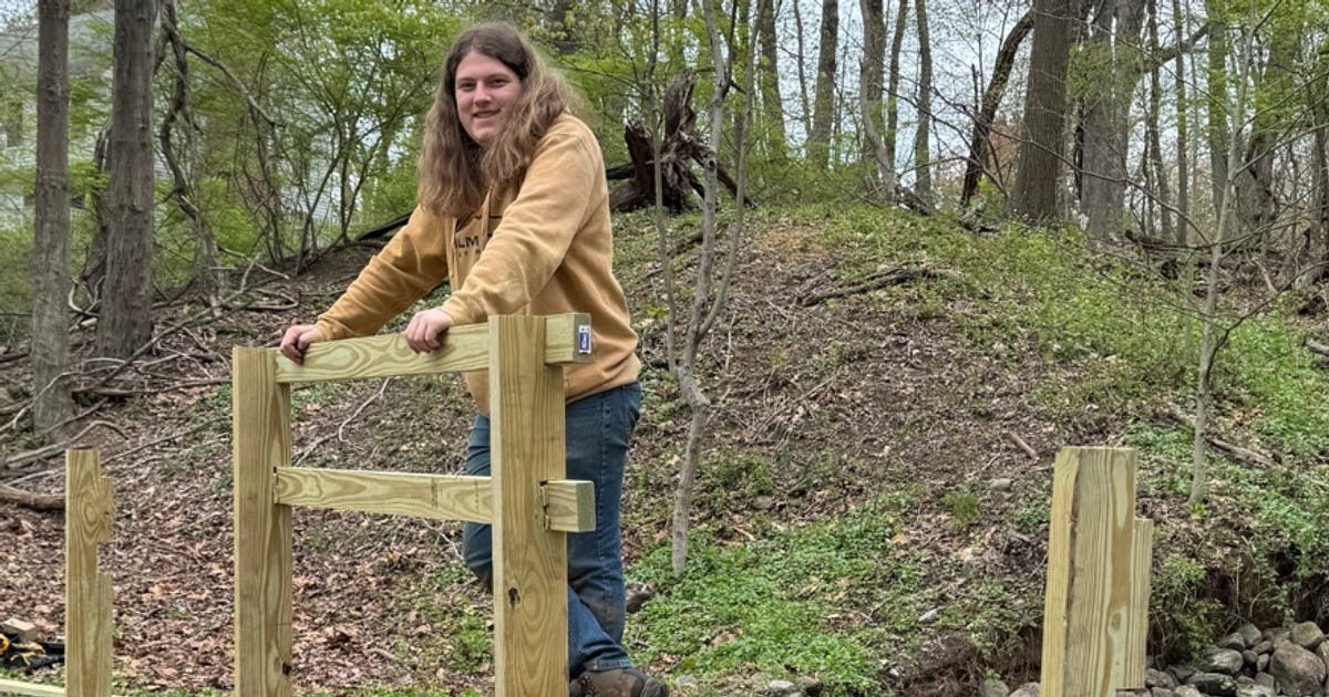 Darien Eagle Scout reconstructs bridge at at Olson Woods